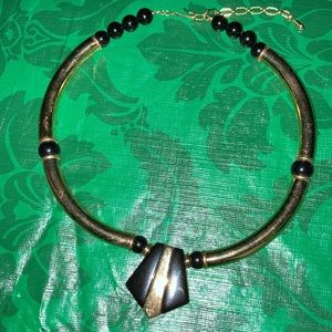 VINTAGE unmarked gt metal& blk beads flexible necklace, hook closure $27